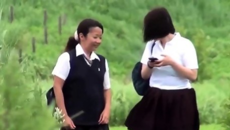 Asian school teens peeing