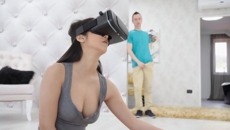 VR fantasy sex turns into reality once her stepbrother walks in on her