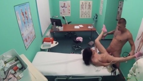 A nymph with big tits gets vaginally fucked by a horny doctor
